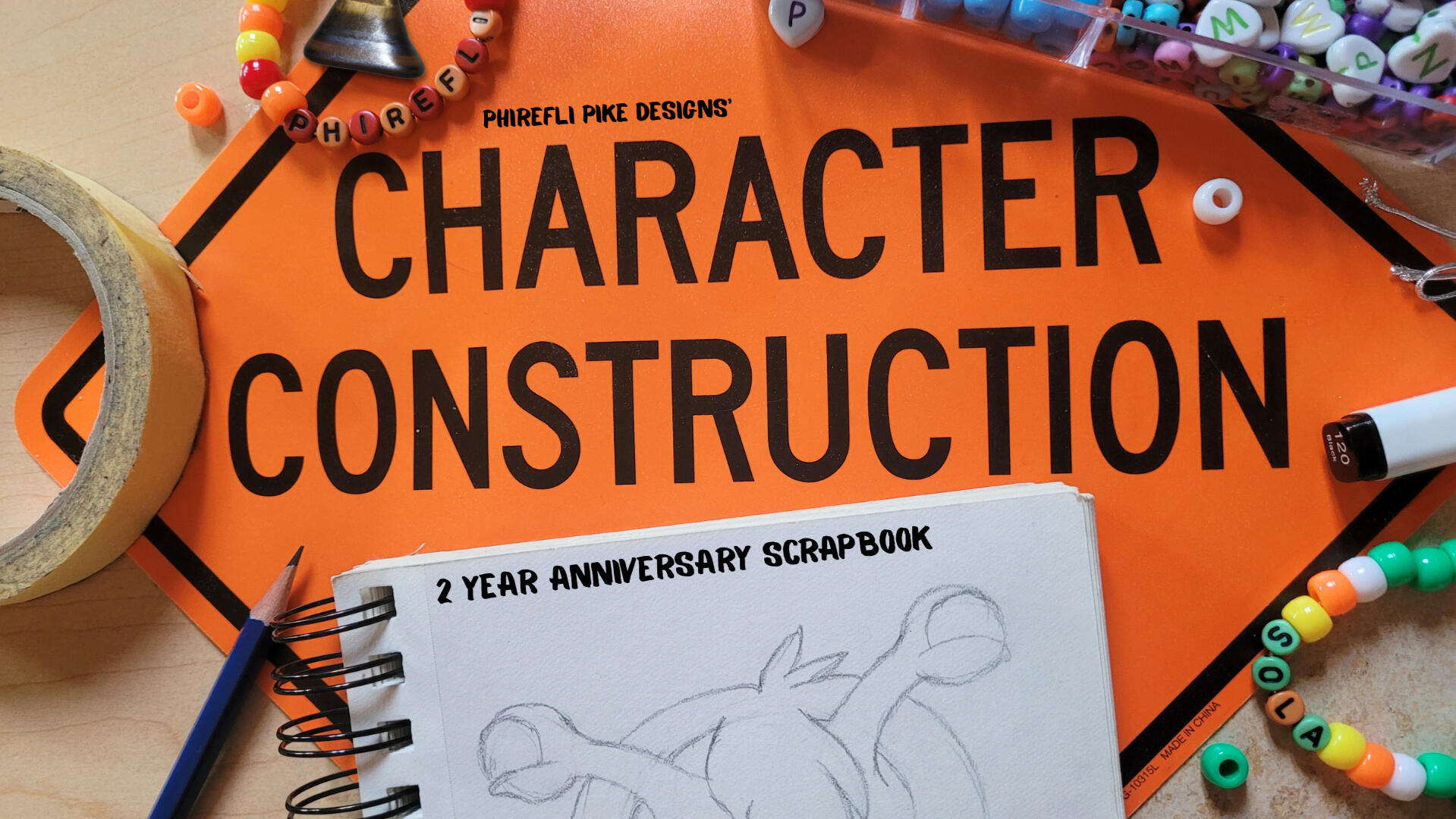 Cover Page: Phirefli Pike Designs' Character Construction 2 Year Anniversary Scrapbook